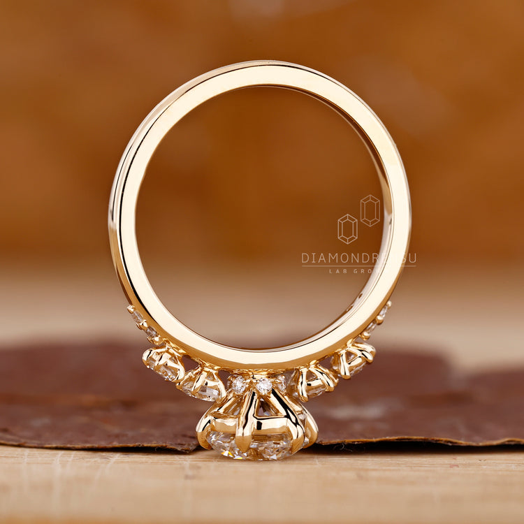 Diamondrensu Engagement Ring featuring lab-grown diamonds in a prong setting.
