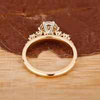 Custom Engagement Ring with round cut diamonds in a prong setting.
