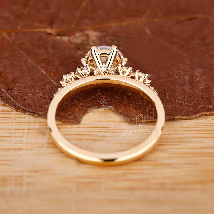 Custom Engagement Ring with round cut diamonds in a prong setting.
