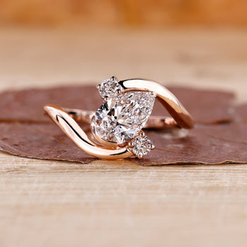 Pear diamond engagement ring in rose gold.
