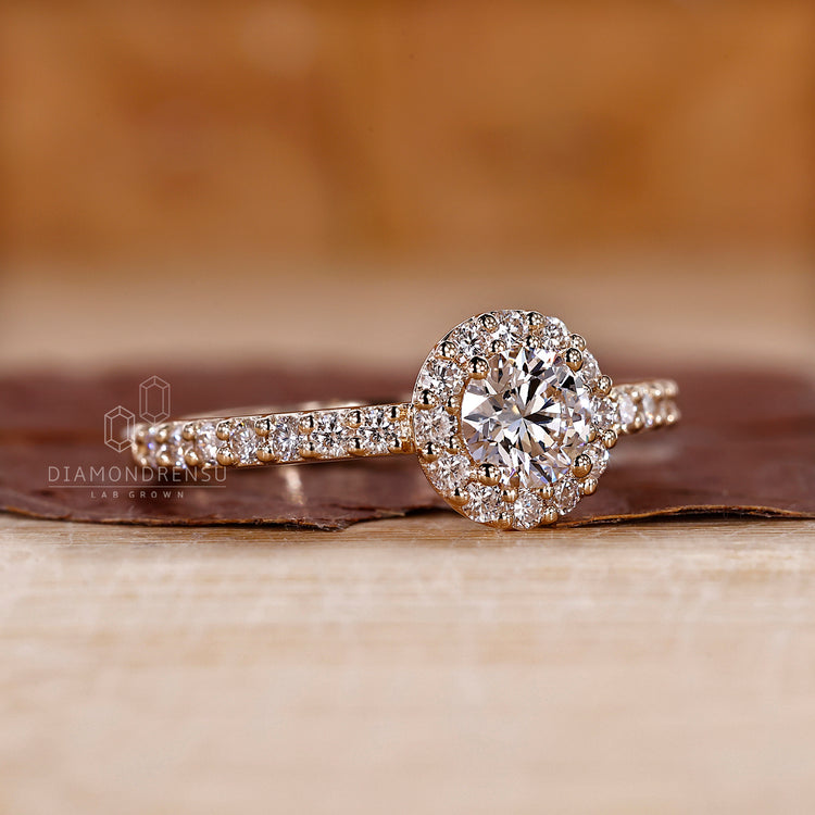 Yellow gold handmade ring with pave round cut diamonds.
