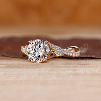 Yellow gold ring paired with 4 prong engagement ring.
