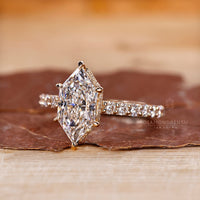 Yellow gold engagement ring with a clean finish.
