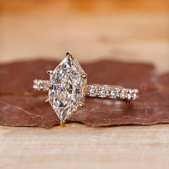 Yellow gold engagement ring with a clean finish.
