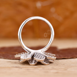 Custom diamond ring with cluster arrangement and nature inspired vintage style.
