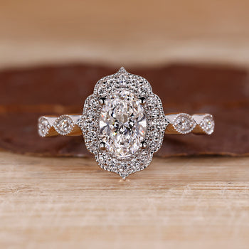 Oval shaped diamond engagement ring in white gold.
