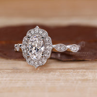 Milgrain setting engagement ring with 4 prongs.

