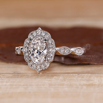 Milgrain setting engagement ring with 4 prongs.

