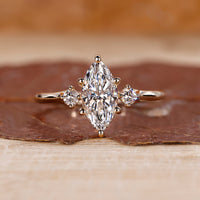 3 stone diamond ring with three diamonds set in a secure prong setting, perfect for a meaningful engagement.
