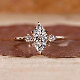 3 stone diamond ring with three diamonds set in a secure prong setting, perfect for a meaningful engagement.
