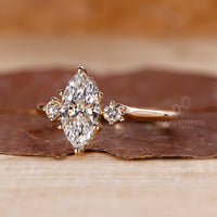 Marquise diamond ring in a yellow gold band, handmade for those who appreciate a unique, vintage-inspired design.
