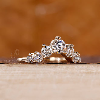 Curved wedding band handcrafted with precision and care.
