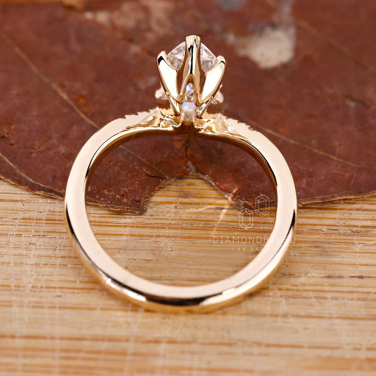 IGI certified marquise engagement ring with clean finish.
