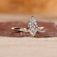6 claw prong setting holds the marquise diamond securely.
