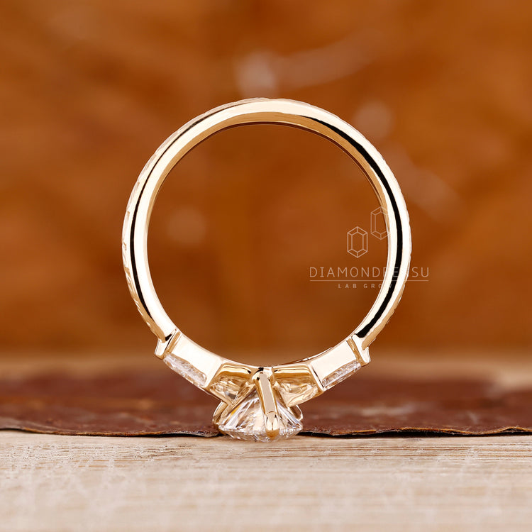 Lab Grown Diamond three stone with pear cut engagement ring art deco.
