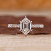Hexagon diamond ring with hexagon step cut and pave setting.
