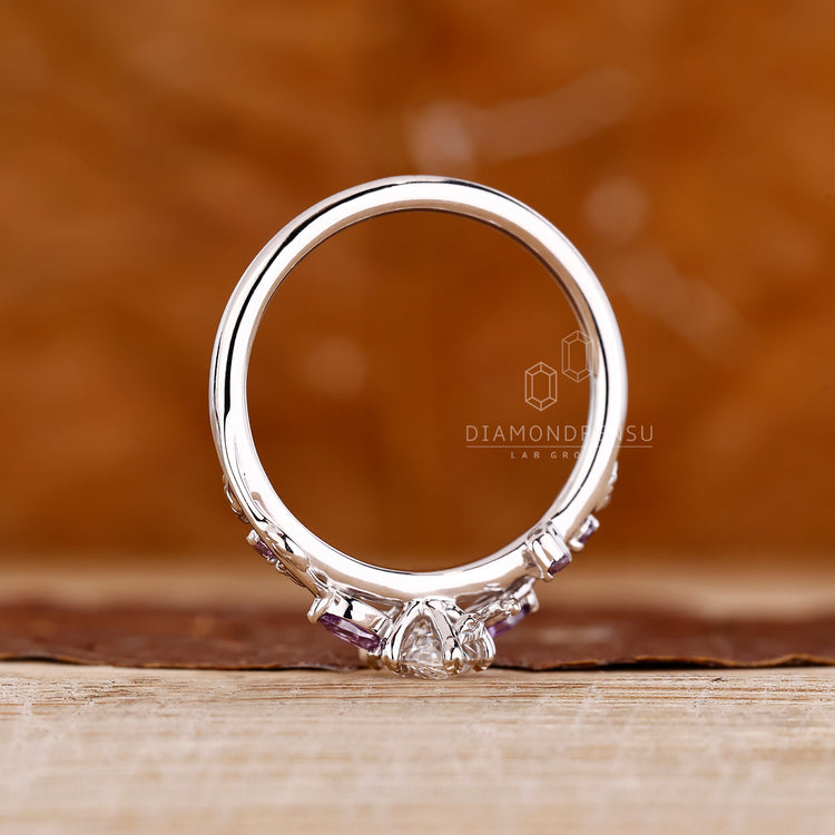 Tanzanite marquise side gemstone on nature inspired ring handmade.
