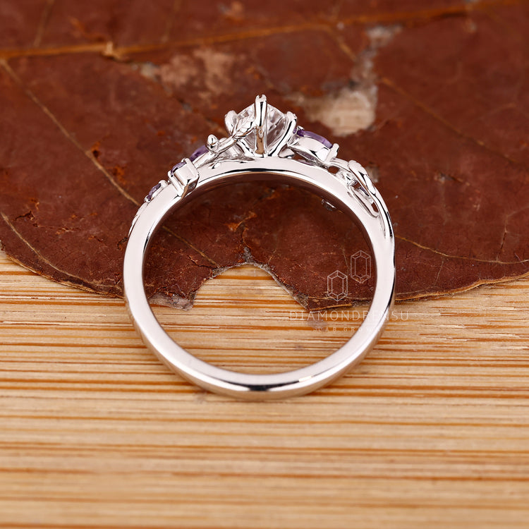 Handmade nature inspired ring with twisted shank and IGI certified.
