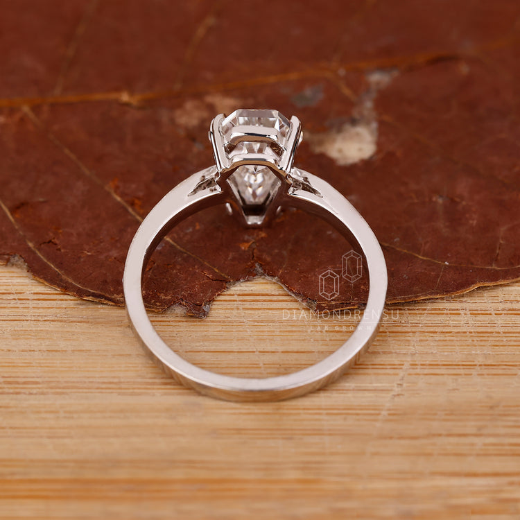 Lab Grown Diamond ring with coffin cut centre stone.
