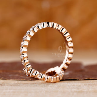 Diamondrensu ring with heart shaped center diamond and pave setting.
