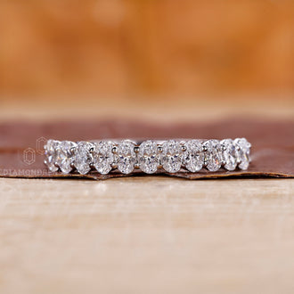Prong set wedding band designed for added brilliance.
