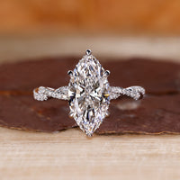 Marquise cut diamond engagement ring in white gold.

