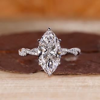 Marquise cut diamond engagement ring in white gold.

