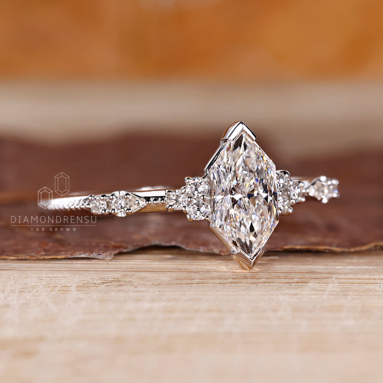 Cluster engagement ring handmade with lab grown diamonds in white gold.
