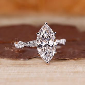 White gold marquise and round diamond ring.
