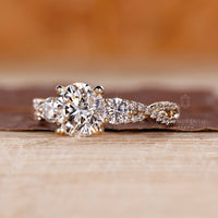 Twisted shank round cut engagement ring with pave setting handmade.
