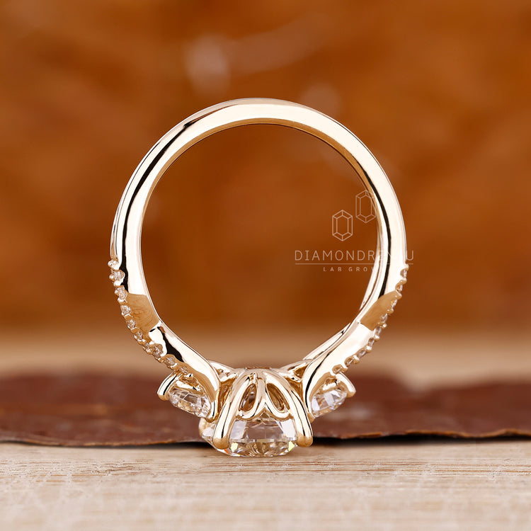 Pave setting on round cut engagement ring with twisted shank.
