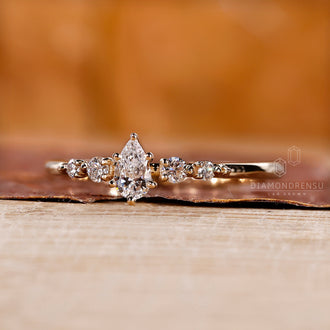 5 stone diamond ring with shared prong setting and custom handmade design.
