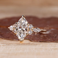IGI certified marquise cut engagement ring made in yellow gold.
