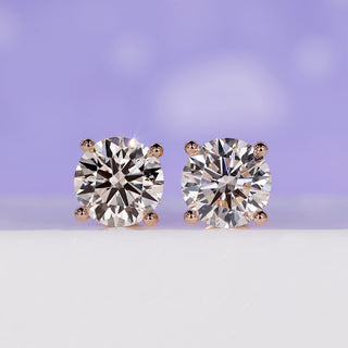 4 Carat Diamond Stud Earrings with a classic diamond prong setting.