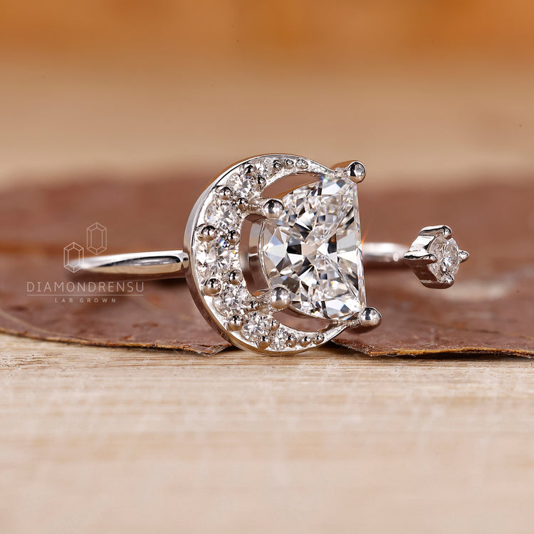 Round side stone ring with prong setting for added brilliance.

