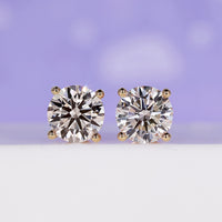 Elegant 4 carat diamond earrings crafted for timeless brilliance.
