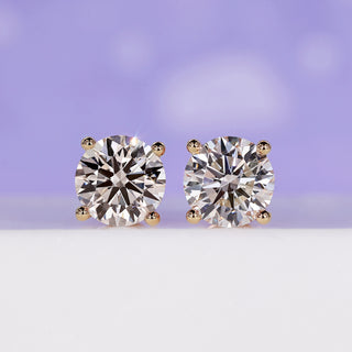 Elegant 4 carat diamond earrings crafted for timeless brilliance.