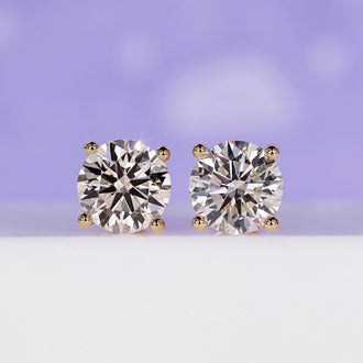 Elegant 4 carat diamond earrings crafted for timeless brilliance.