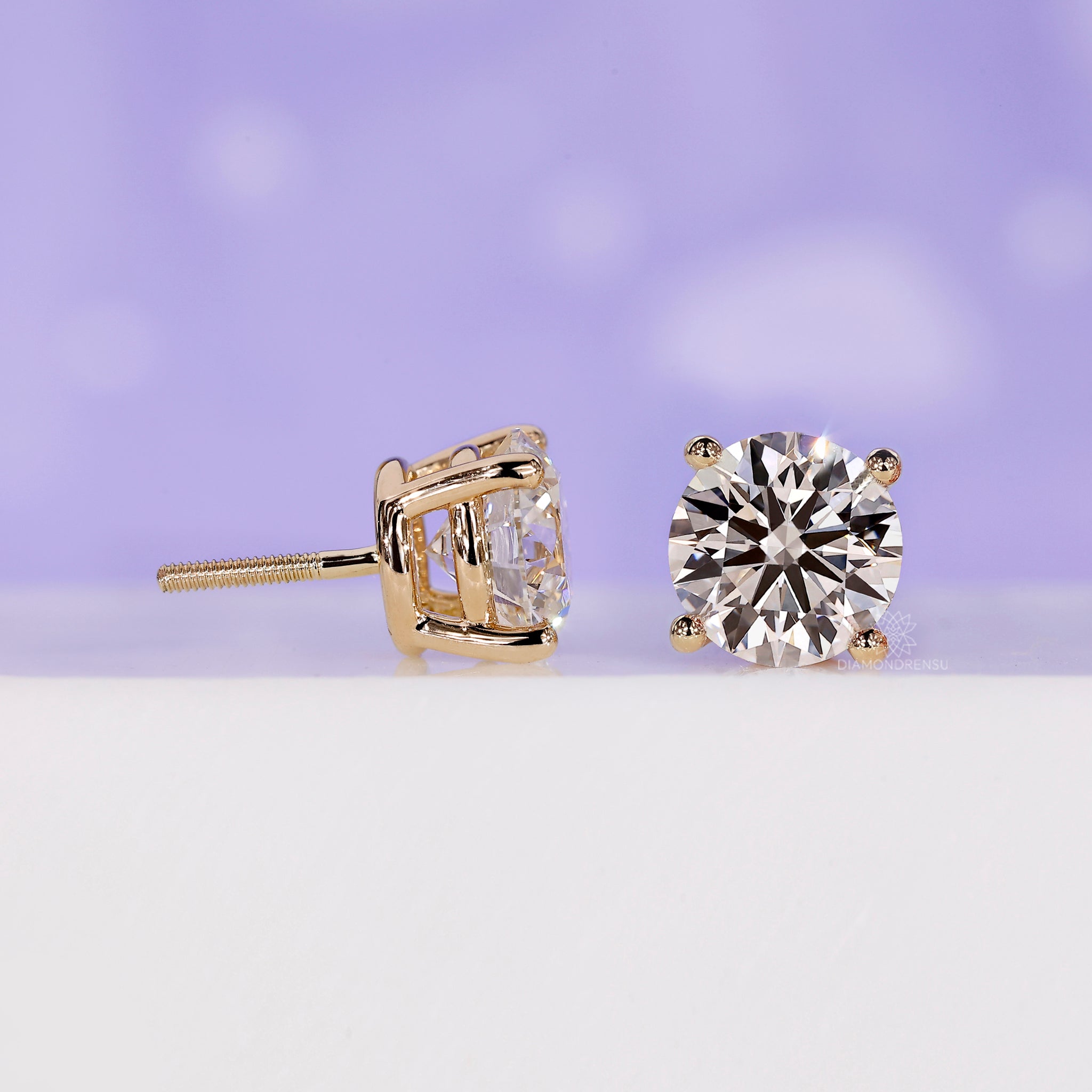 Classic round cut diamond earrings perfect for every occasion.