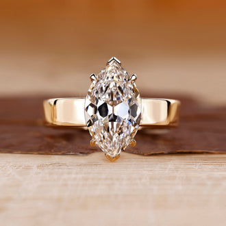 Old European cut diamond ring in yellow gold solitaire setting.
