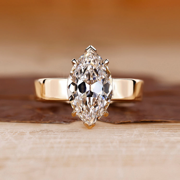 Old European cut diamond ring in yellow gold solitaire setting.
