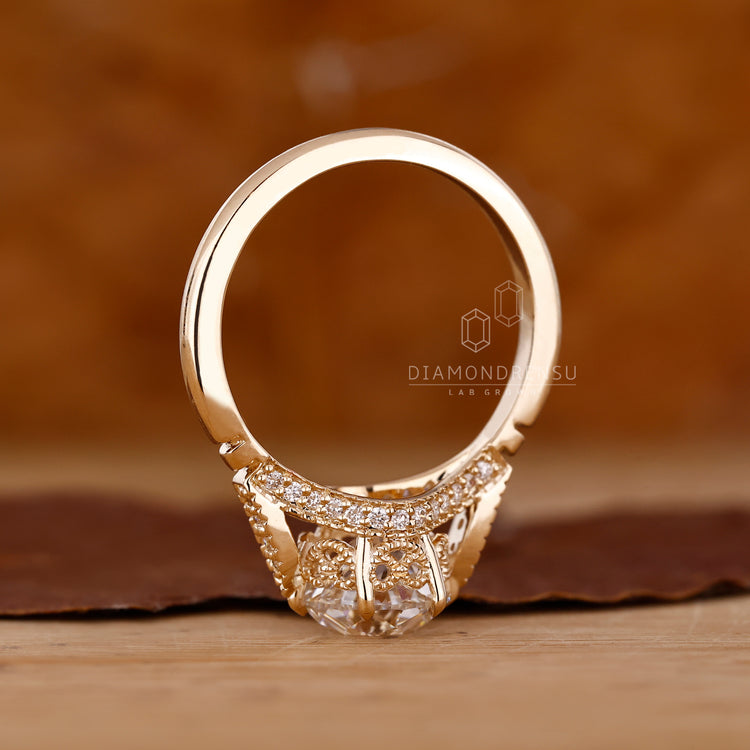 Lab grown diamond in a vintage-style engagement ring.
