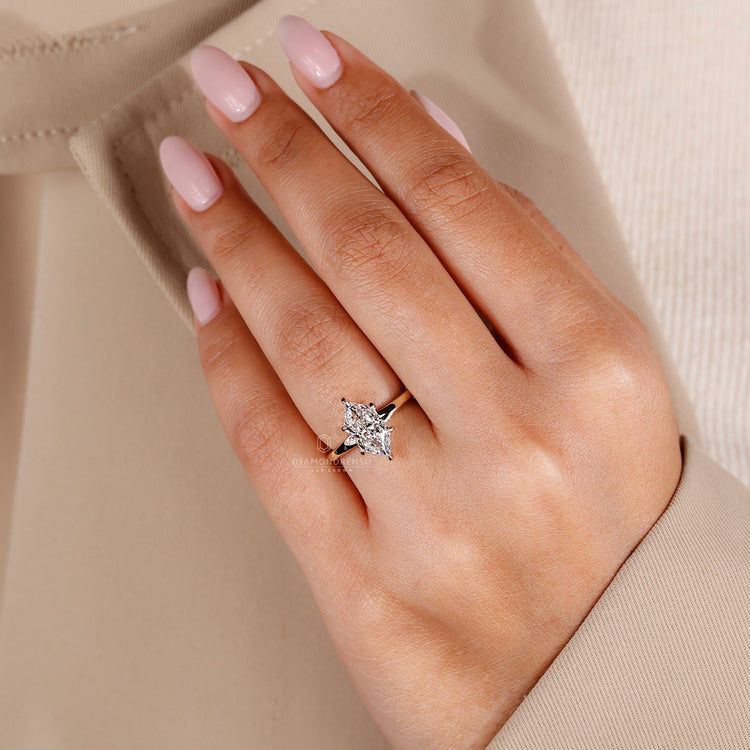 Marquise diamond set in a Dutch marquise ring with 6 claw prong and lab grown diamond in yellow gold.
