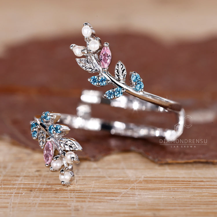 Handmade band with gemstone wedding band design in white gold.
