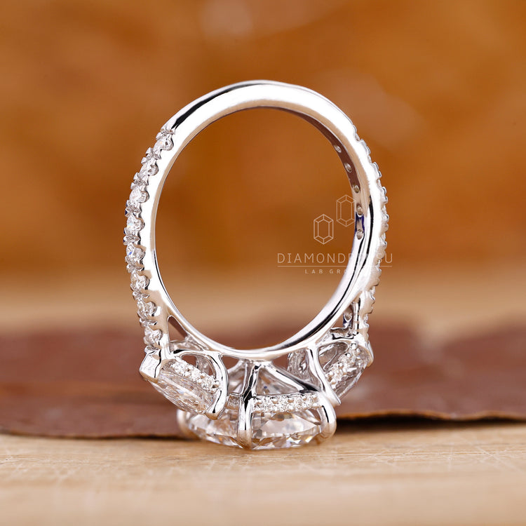 IGI certified engagement ring in white gold with cushion hidden halo.
