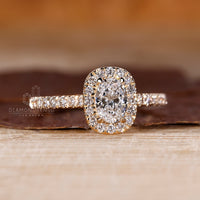 Oval and round diamond ring with pave band.
