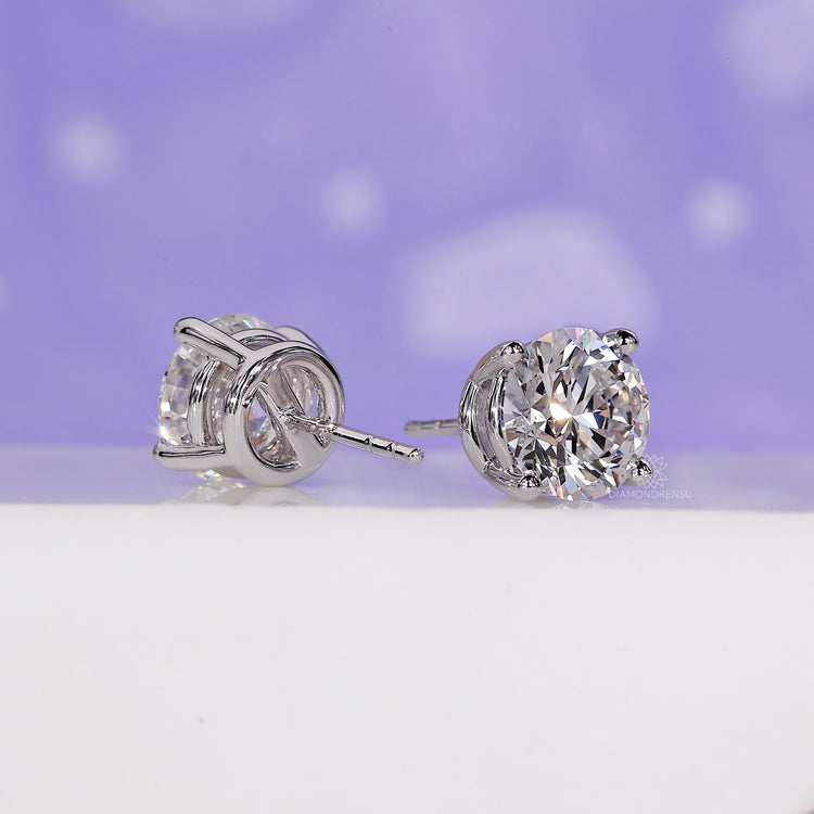 Screw back diamond earrings with 4 prong earrings for added durability.