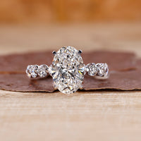 White gold oval diamond ring crafted for a bright and timeless look.
