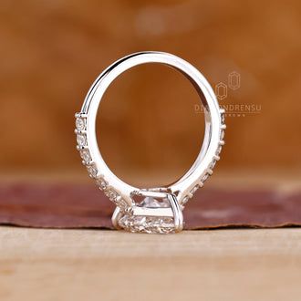 White gold handmade ring with delicate pavé round diamond band.
