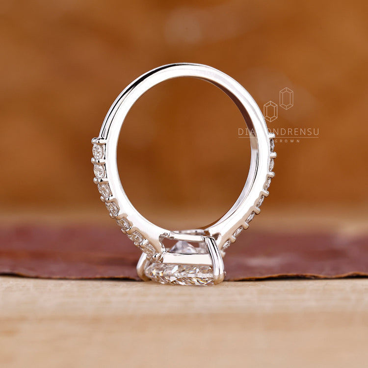 White gold handmade ring with delicate pavé round diamond band.
